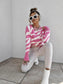 Pink and white zebra print jumper 